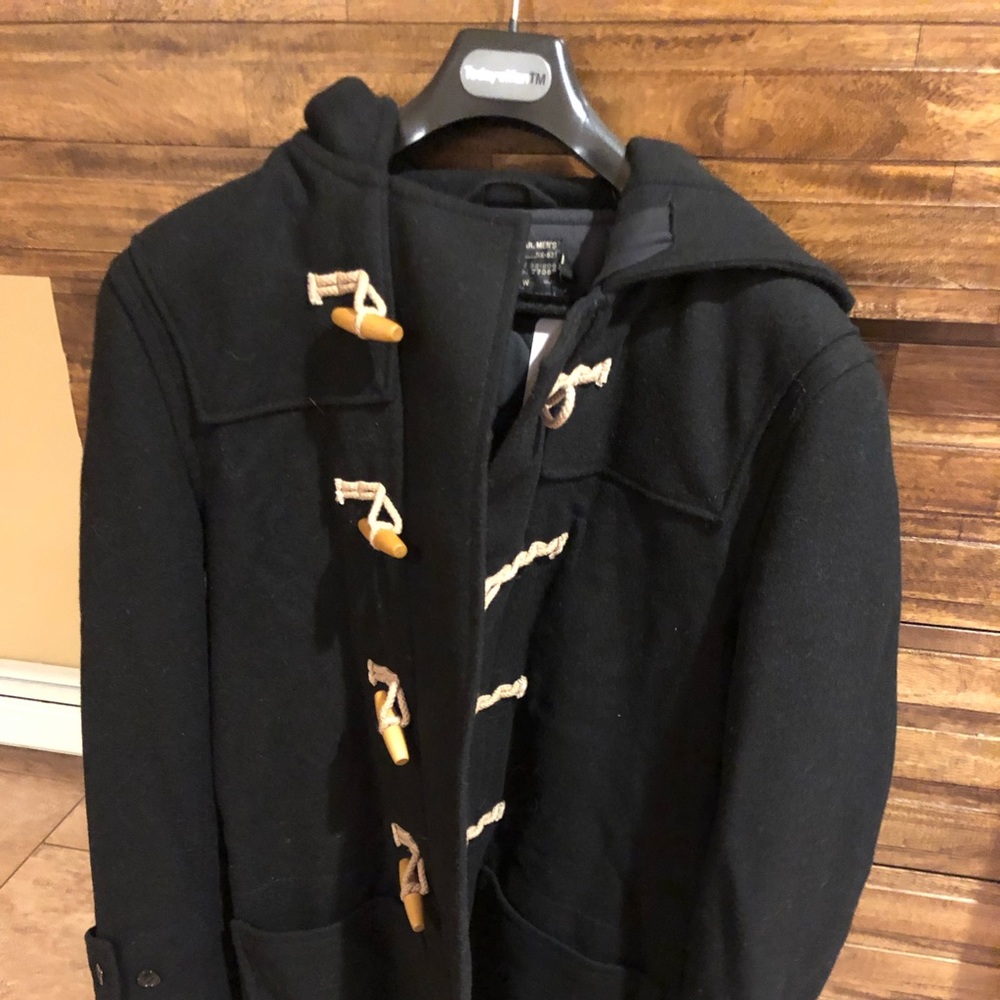 Never worn, warm and comfortable black peacoat for sale.